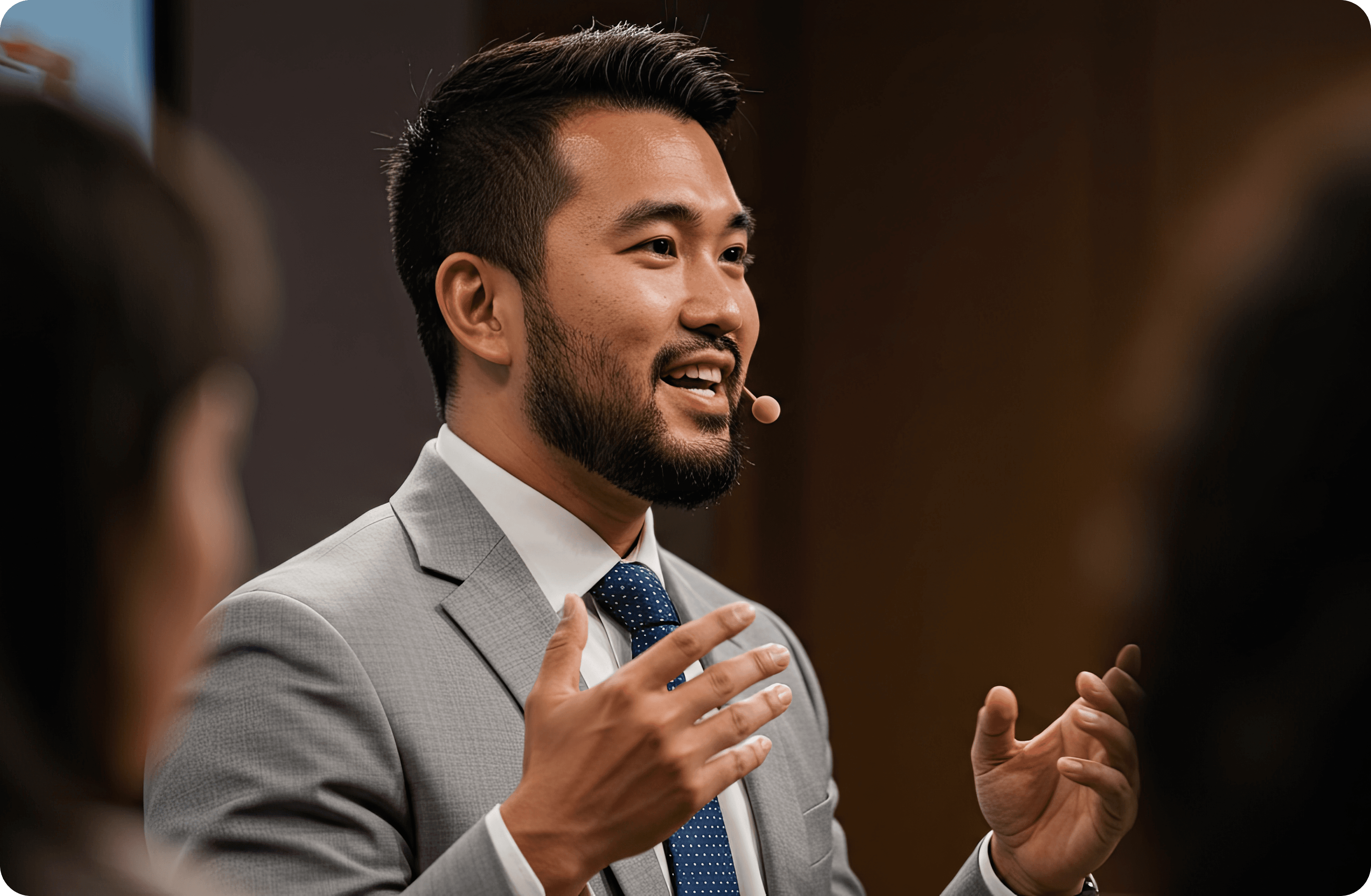 Blockchain expert speaking at a conference about cryptocurrency and blockchain technology